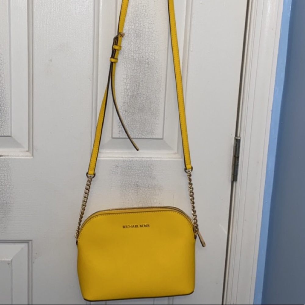 Michael Kohrs cross body yellow purse
